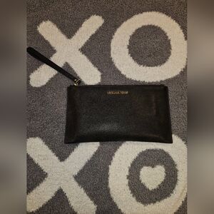 Michael Kors Black Clutch Sleek Design
